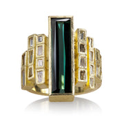 Todd Reed ring with Tourmaline (4.10ct) white baguettes (~.41ct), cognac baguettes (~.76ct), and 18k yellow gold